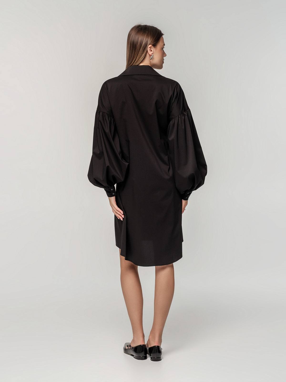 Short black shirt dress with long puff sleeves