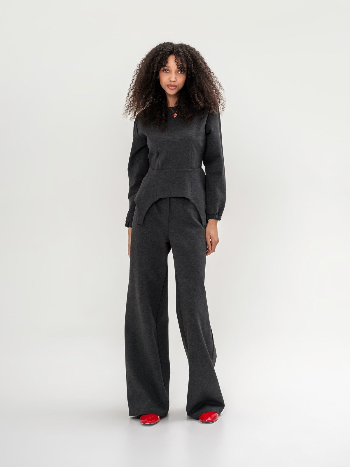 Garter inspired top with long sleeves and wide leg trousers