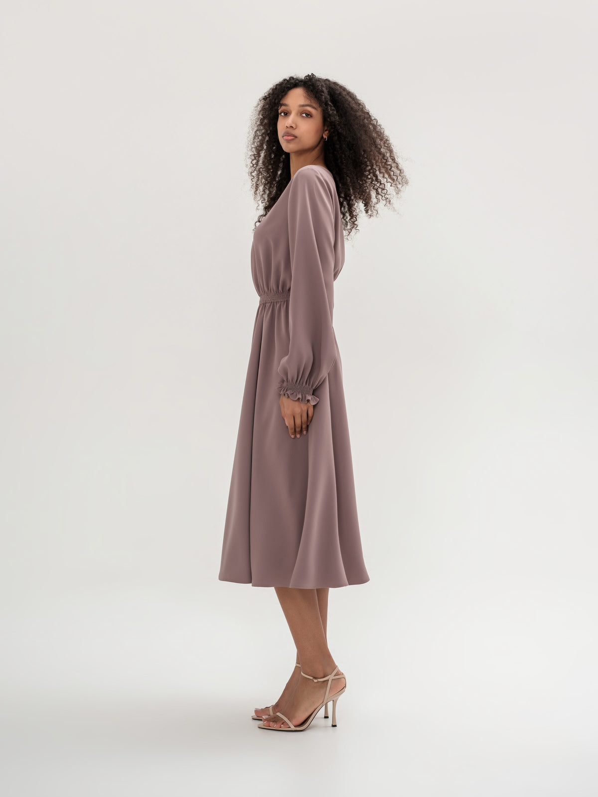 Classic midi cappuccino dress with long sleeves with elastic in the waistband and cuffs