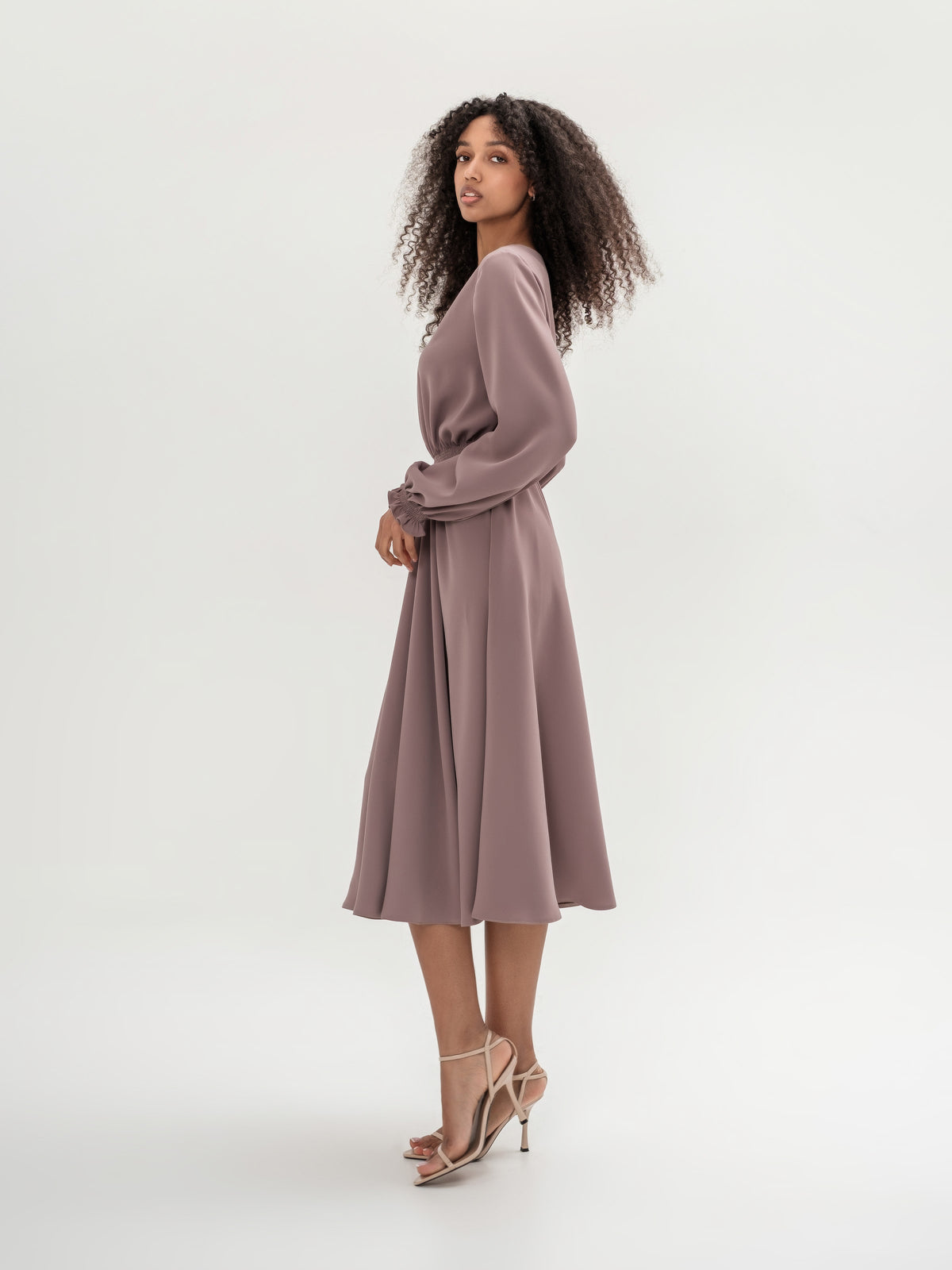 Classic midi cappuccino dress with long sleeves with elastic in the waistband and cuffs
