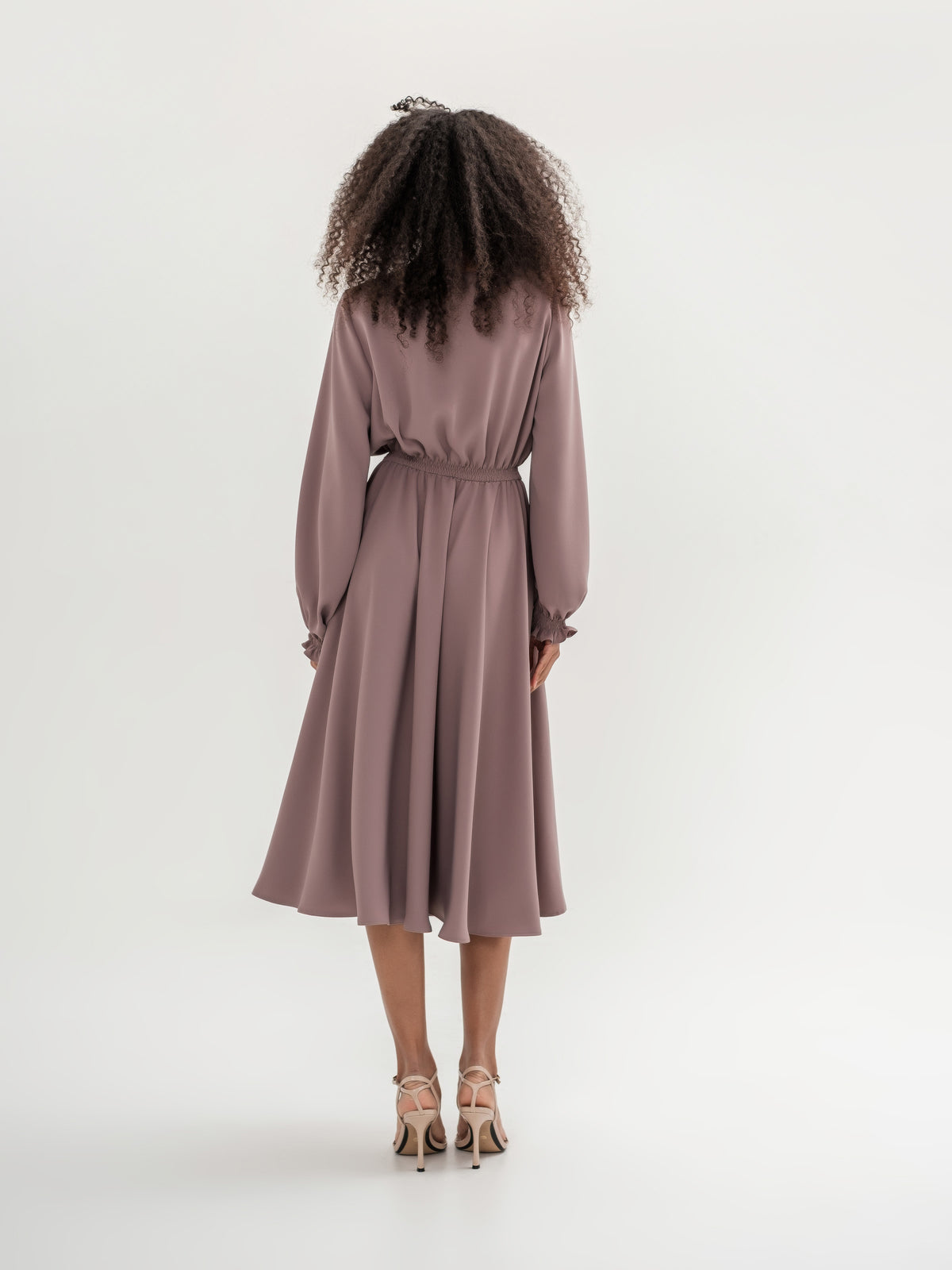 Classic midi cappuccino dress with long sleeves with elastic in the waistband and cuffs