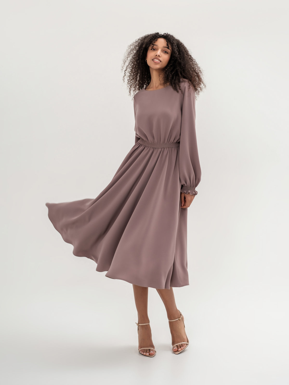 Classic midi cappuccino dress with long sleeves with elastic in the waistband and cuffs