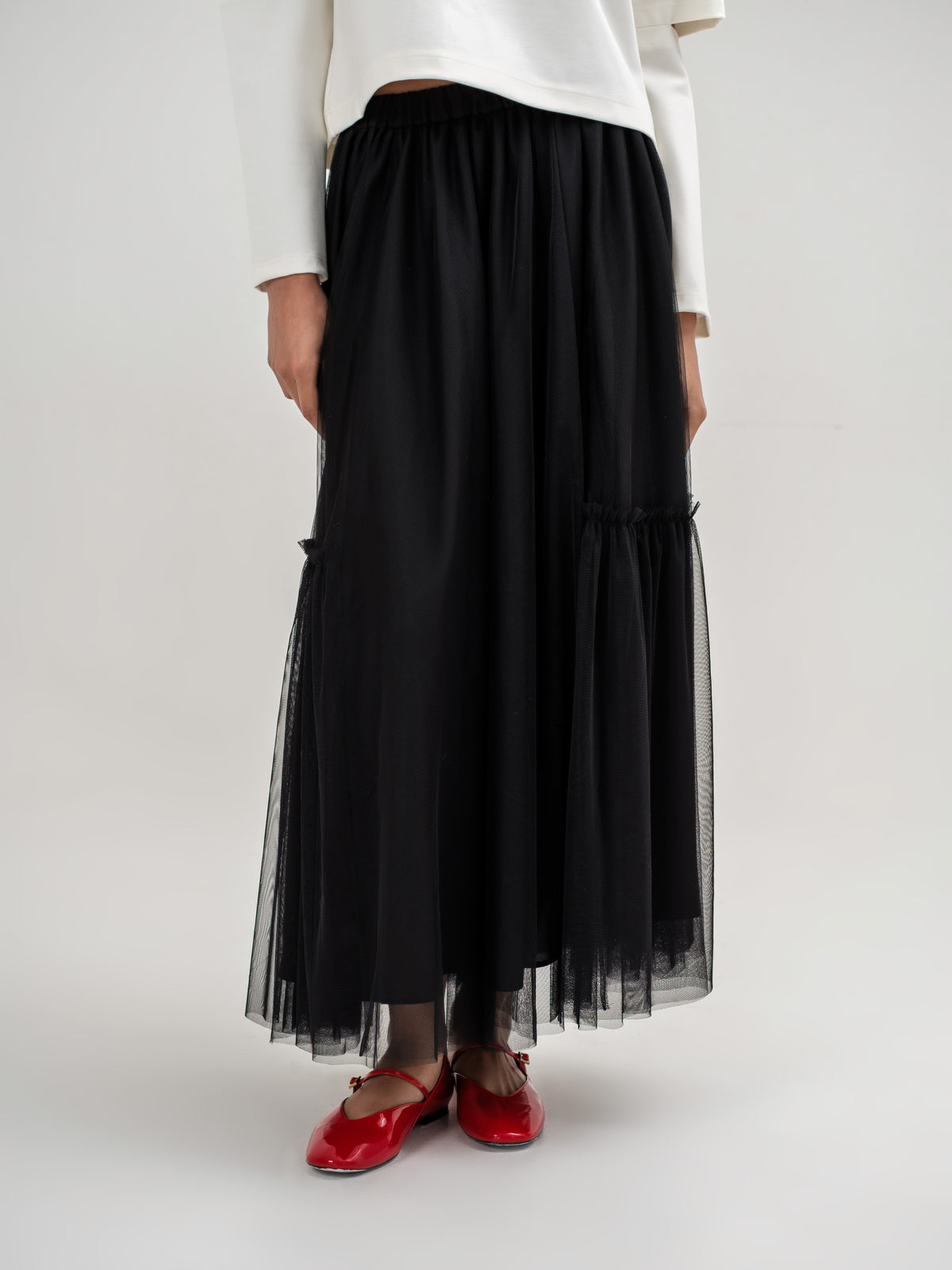 Black tulle lined skirt with elastic waist one size